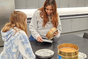 Students working with sediment sieves