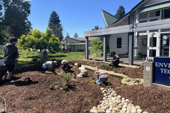 Students installing Bioswale