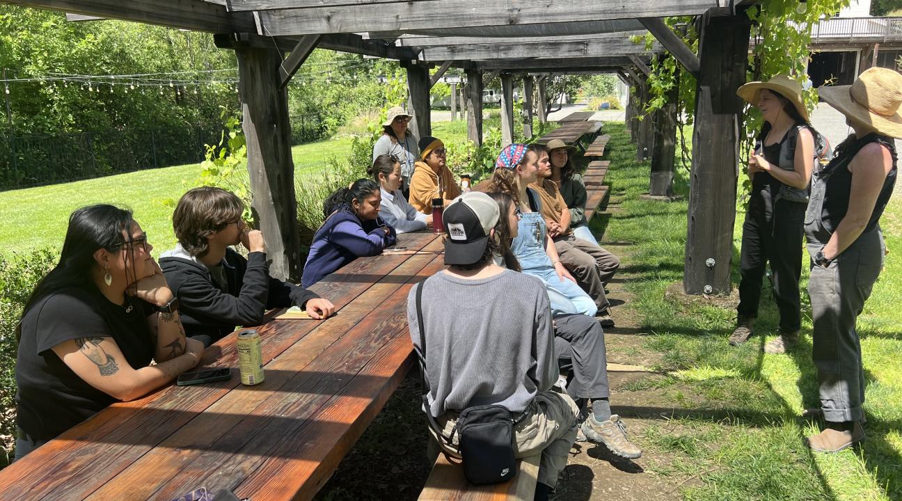 Students sitting at table in Green Valley Farm
