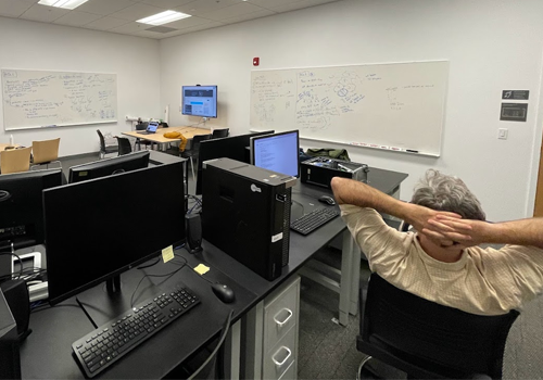 Dr. Clark sitting in CIGA Lab