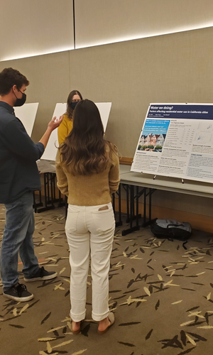 Student presenting research at a symposium