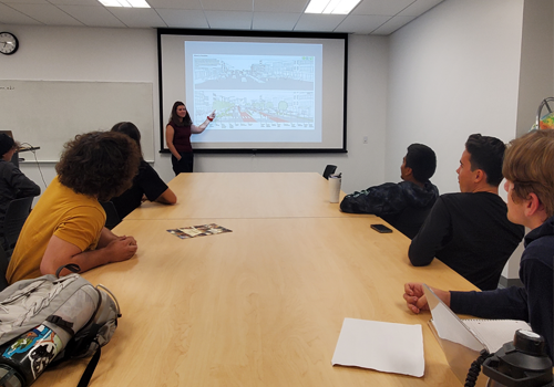 Student giving presentation to a class