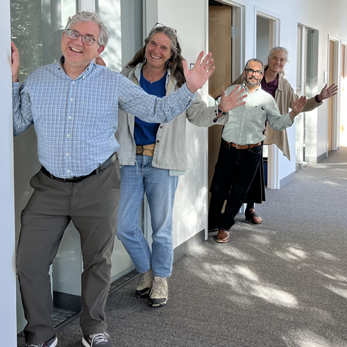 Drs. Clark, Goman, Soto and Laney standing in hallway